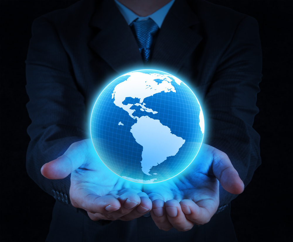 businessman holding a glowing earth globe in his hands businessman holding a glowing earth globe in his hands